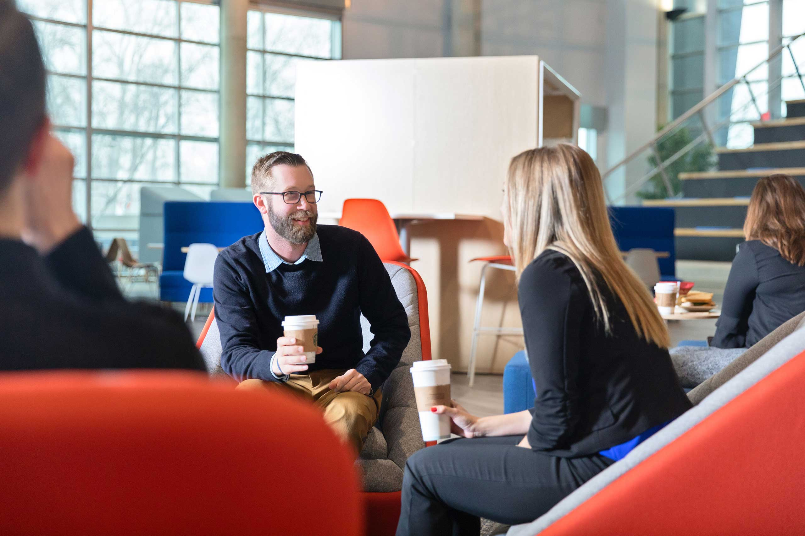 Two people enjoying coffee and conversation